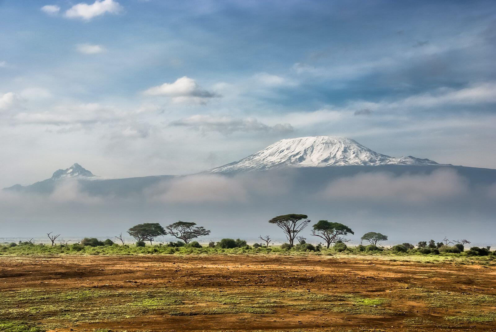 Snow-capped Mount Kilimanjaro rising above the savanna