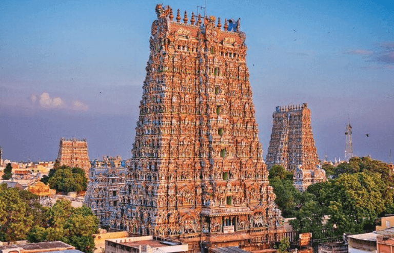 Sculpture-covered gopurams of Meenakshi Amman Temple in Madurai